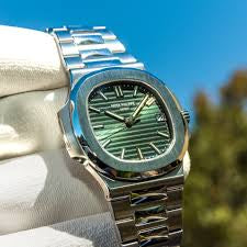 PATEK PHILIPPE GENEVE CHAIN WITH GREEN DIAL